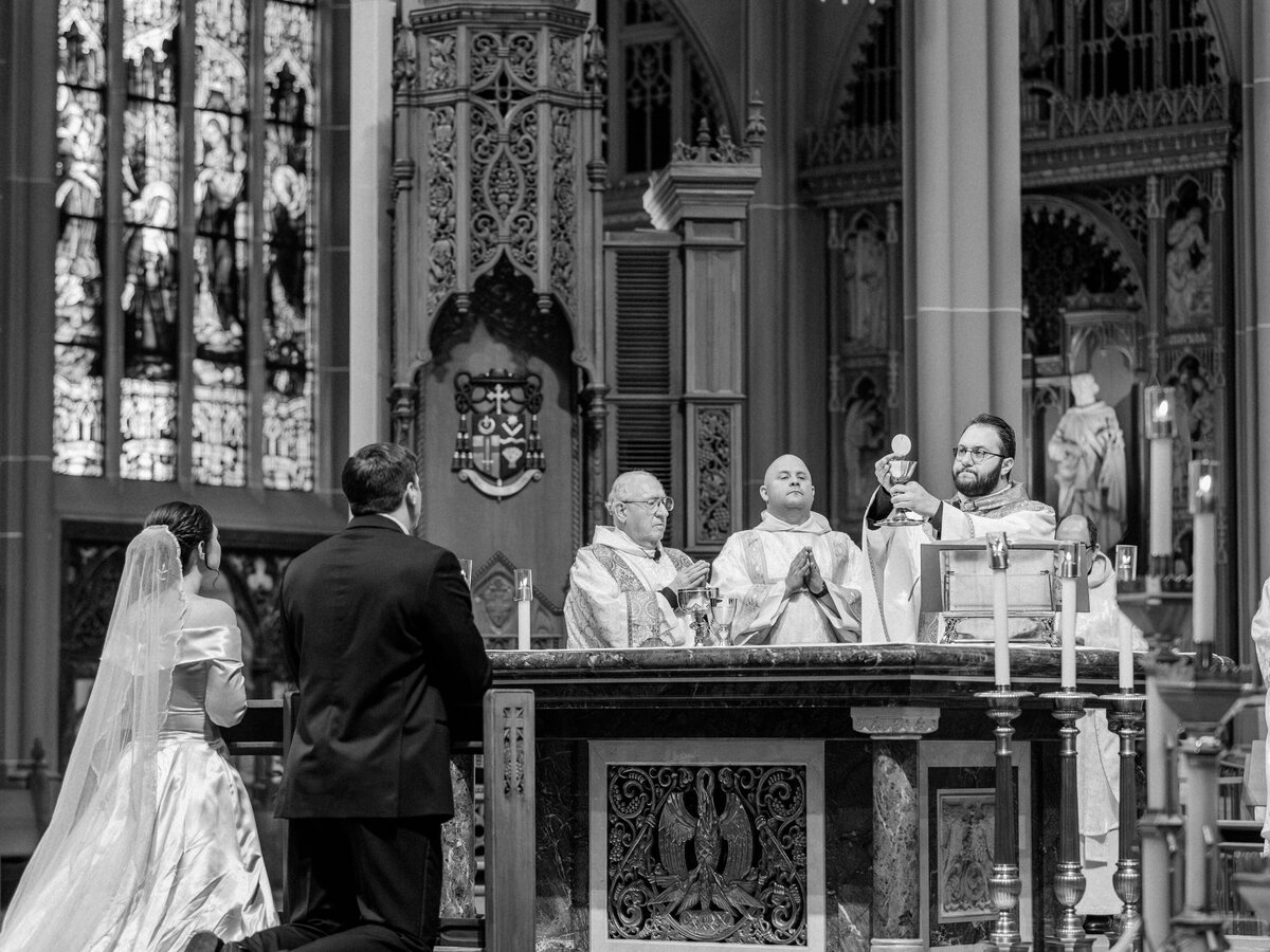 Liturgy of the Eucharist during Cathedral Basilica of the Assumption wedding in Covington, KY