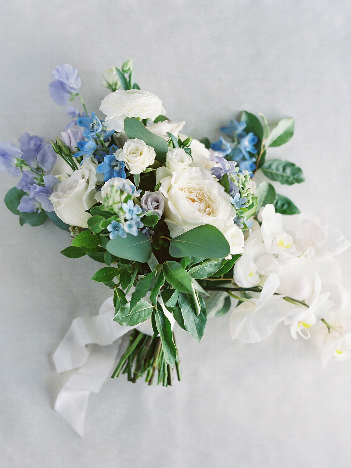 Kate Campbell Floral cream blue and lavender bridal bouquet sweet pea garden roses tweedia