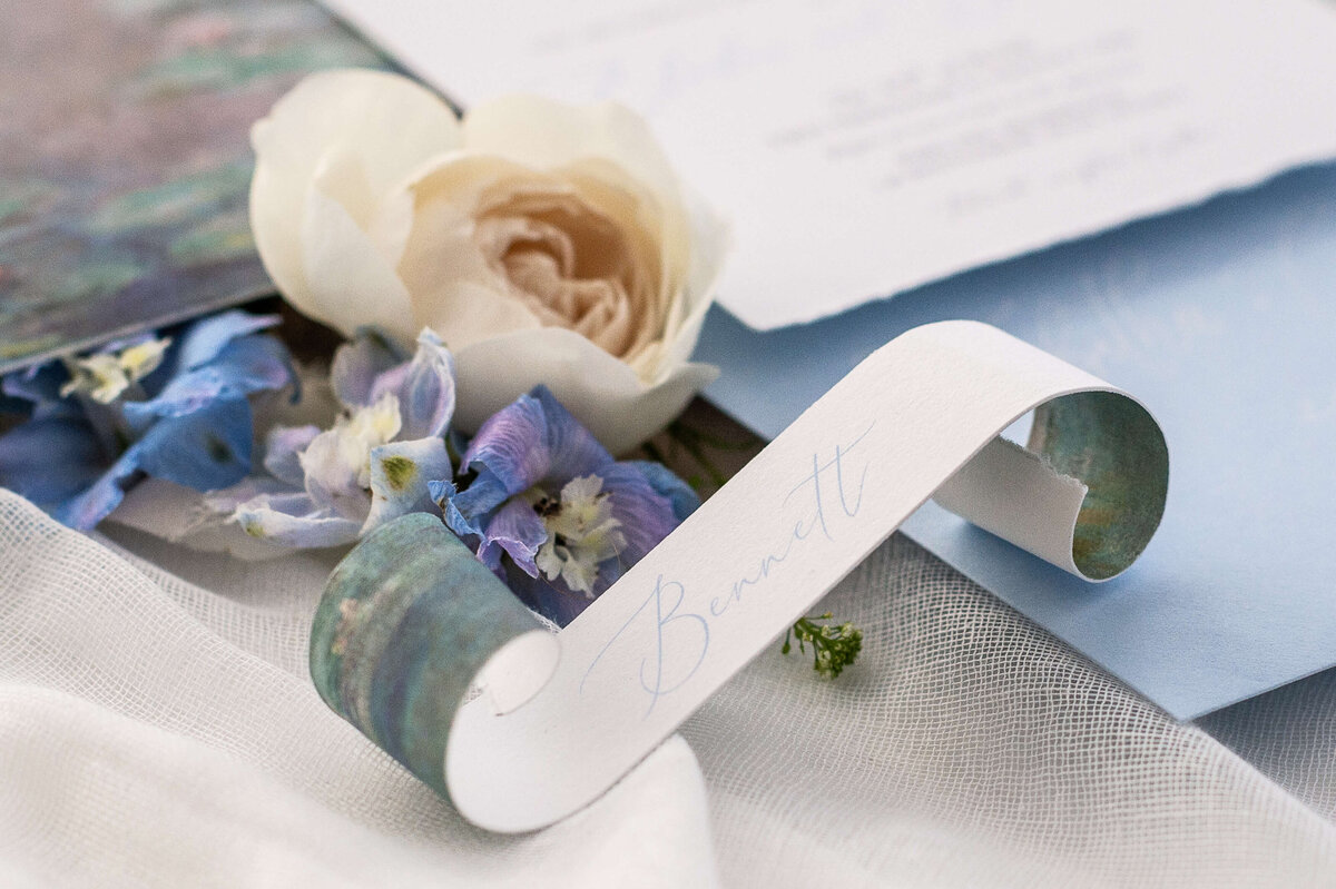 closeup detail photo of blue wedding placecards created for Ottawa weddings