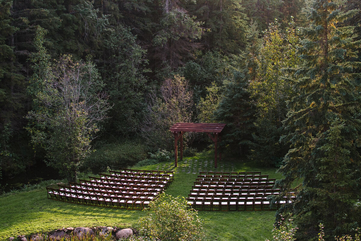 Stunning outdoor ceremony space at The Valley Weddings, a rustic and majestic wedding venue in Westerose, Alberta, featured on the Brontë Bride Vendor Guide.