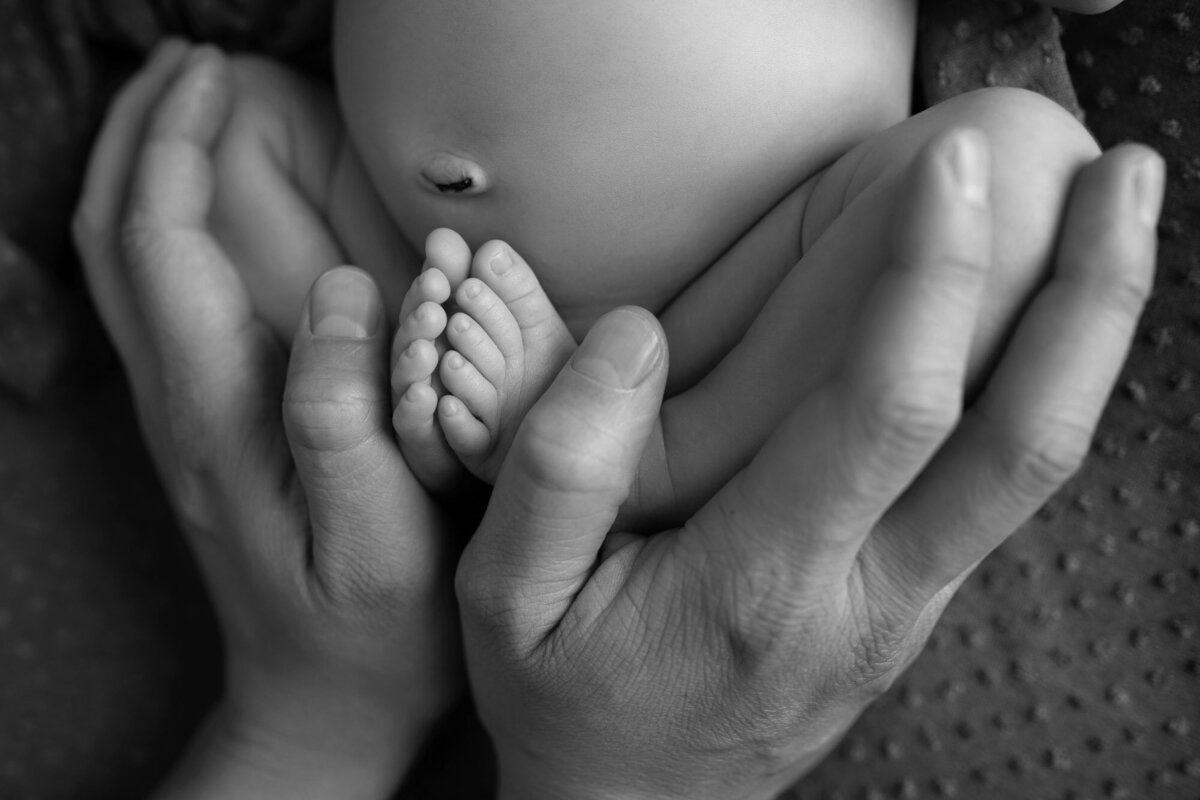 Black white newborn baby feet detail Westlake artistic family photographer