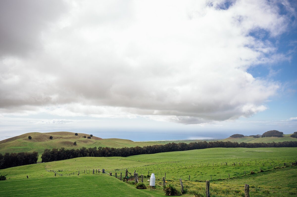 views of the rolling hills and ocean at Kahua Ranch