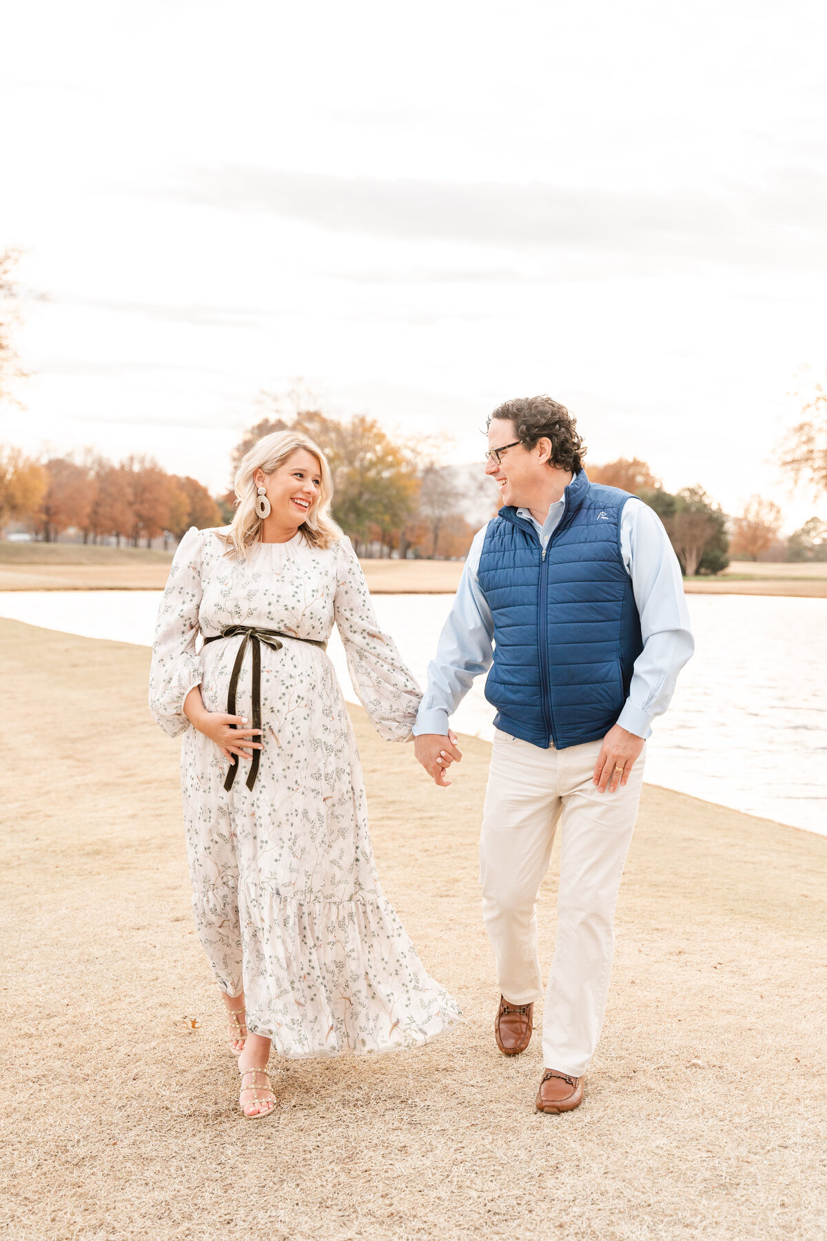 Couple walks holding hands at Chattanooga golf and country club