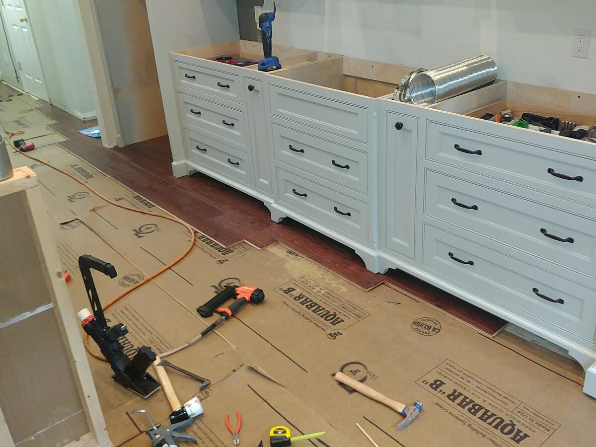 progress of installing kitchen cabinets and drawers