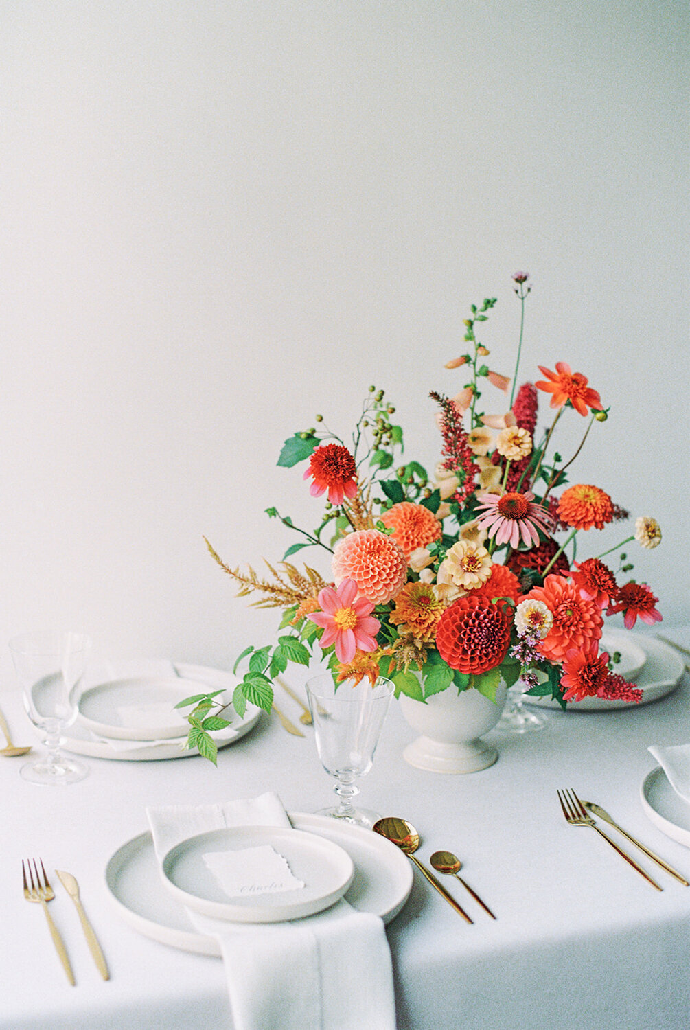 colorful-peach-orange-wedding-flower-centerpiece