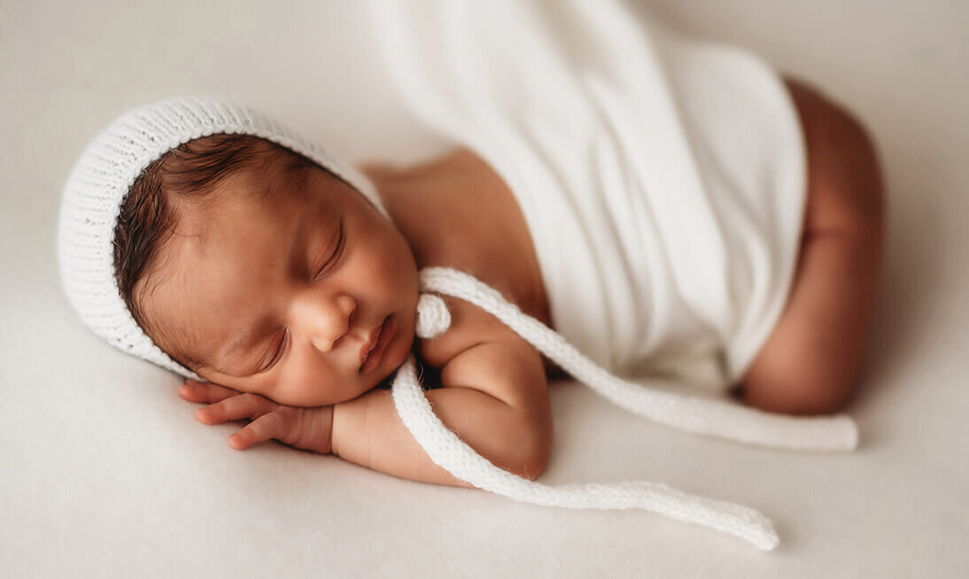 Newborn Baby posed for Newborn Photos in Asheville, NC.