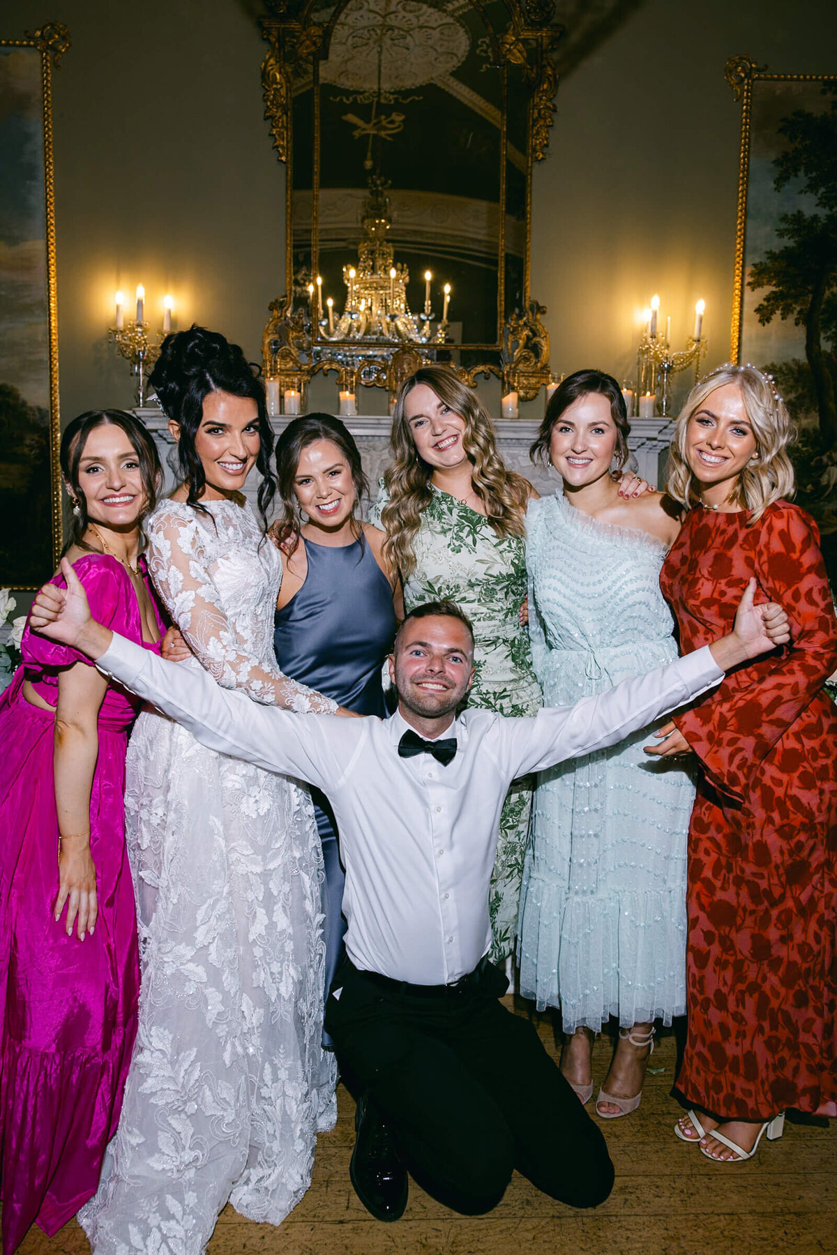 A wedding photo of the bride and friends celebrating at Luttrellstown Castle