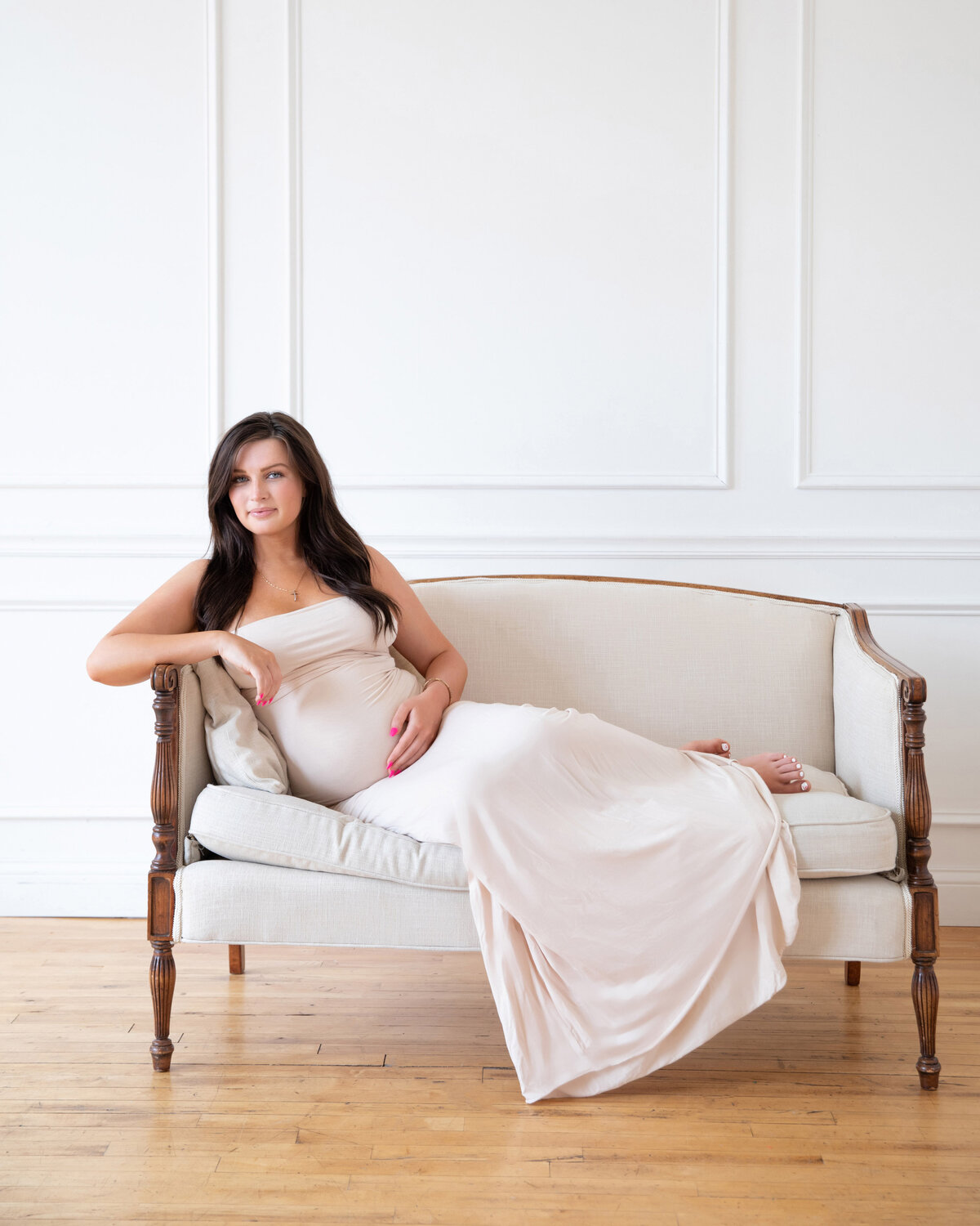 maternity-gown-drapped-off-couch