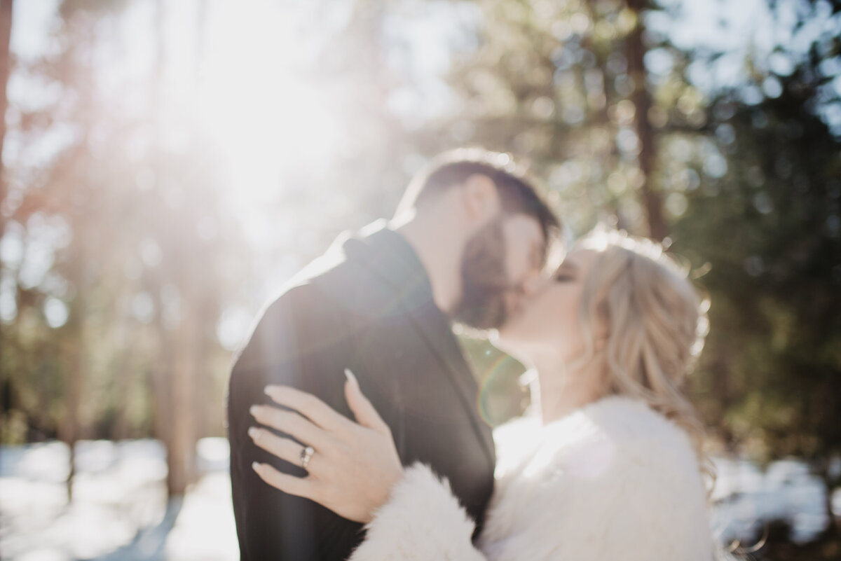 Jackson Hole Photographers capture husband and wife kissing