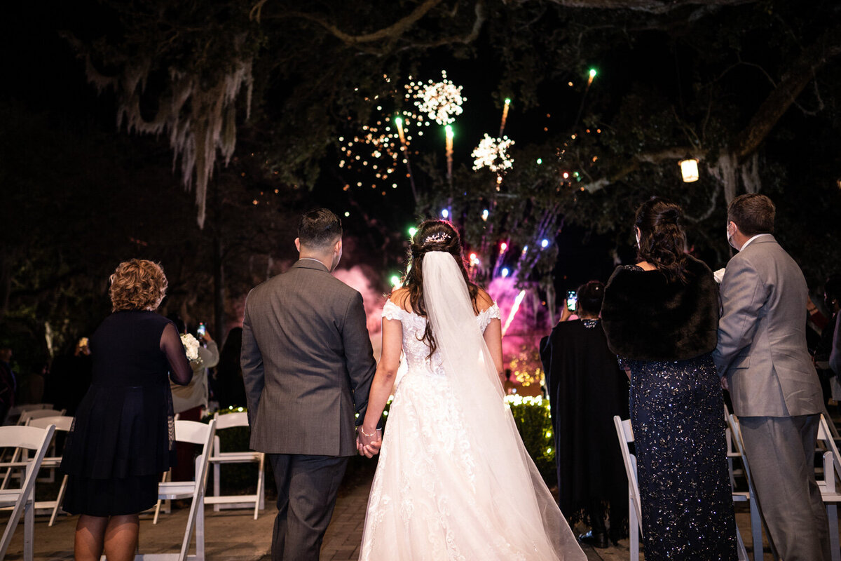 Couple watching fireworks show at Southern Oaks