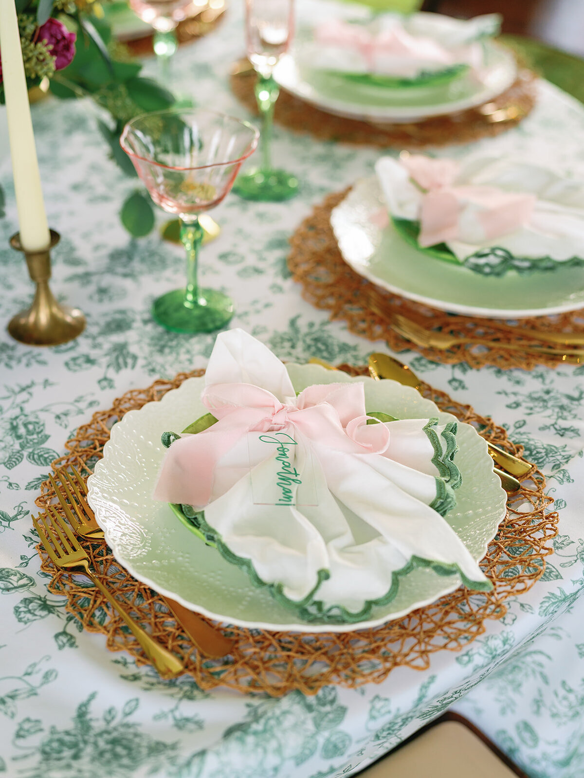 Sage green china with blush napkins and green floral linens