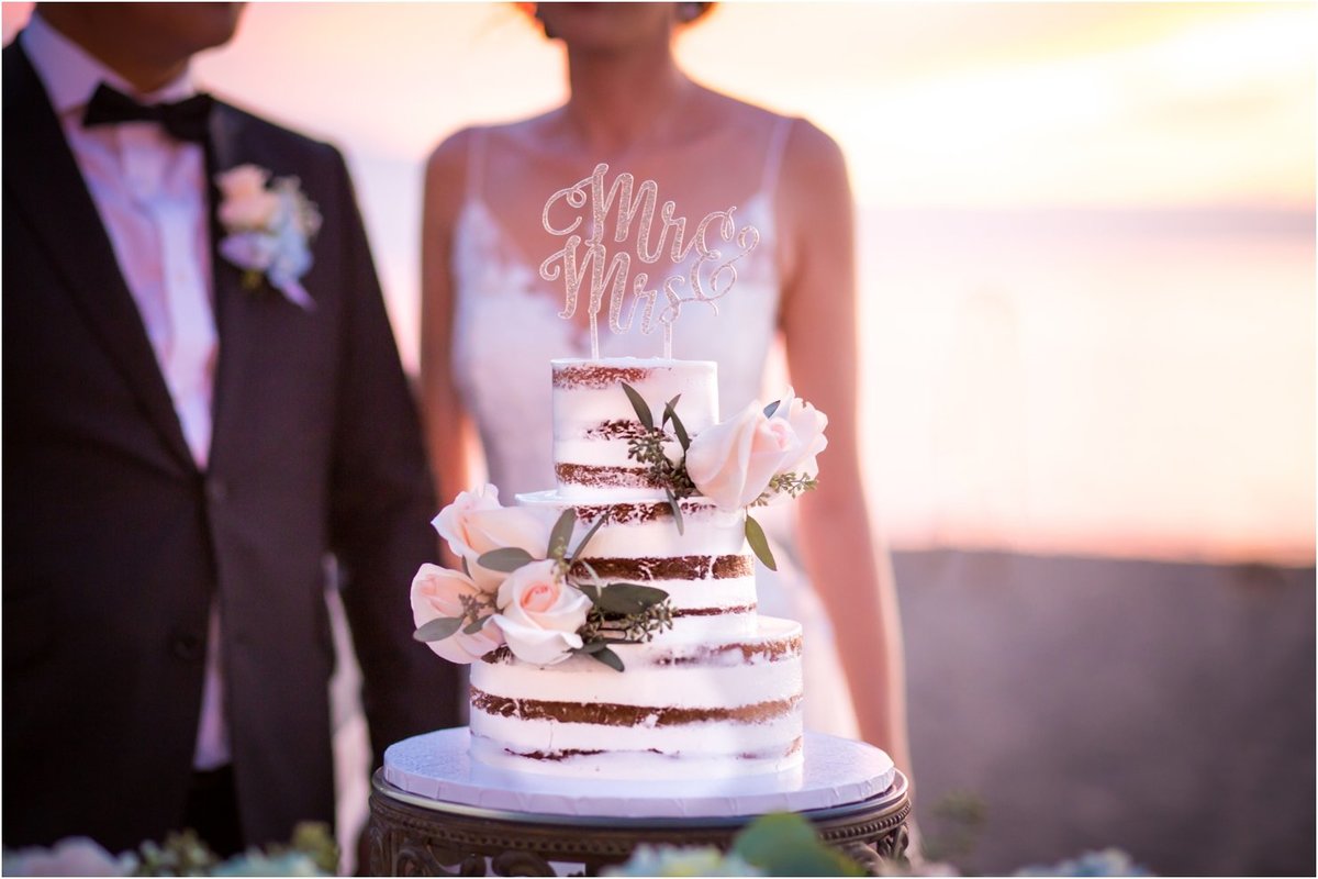 Maui Wedding Photography at The Westin Maui Resort and Spa  of the wedding cake at sunset