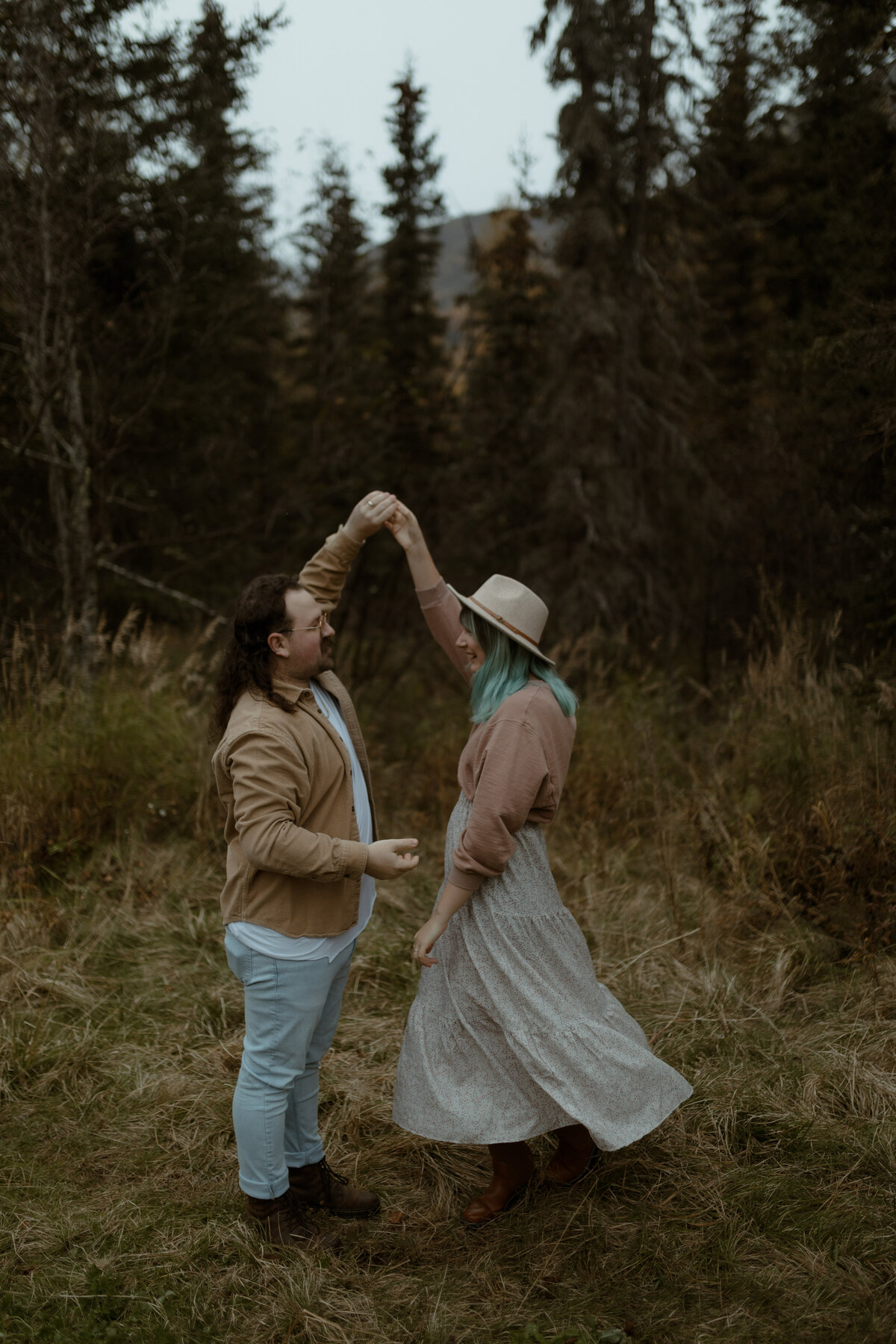 couple dancing in woods
