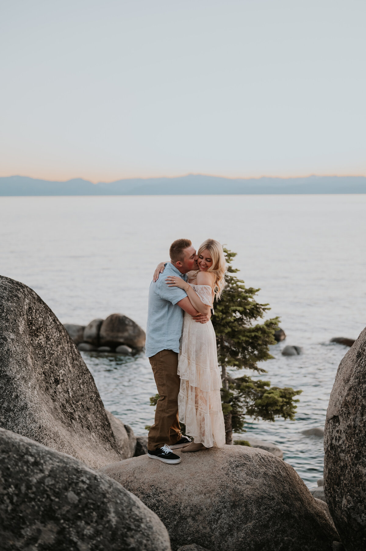 a couple posing for the camera in lake tahoe and proposal photographer in lake tahoe photographer in lake tahoe