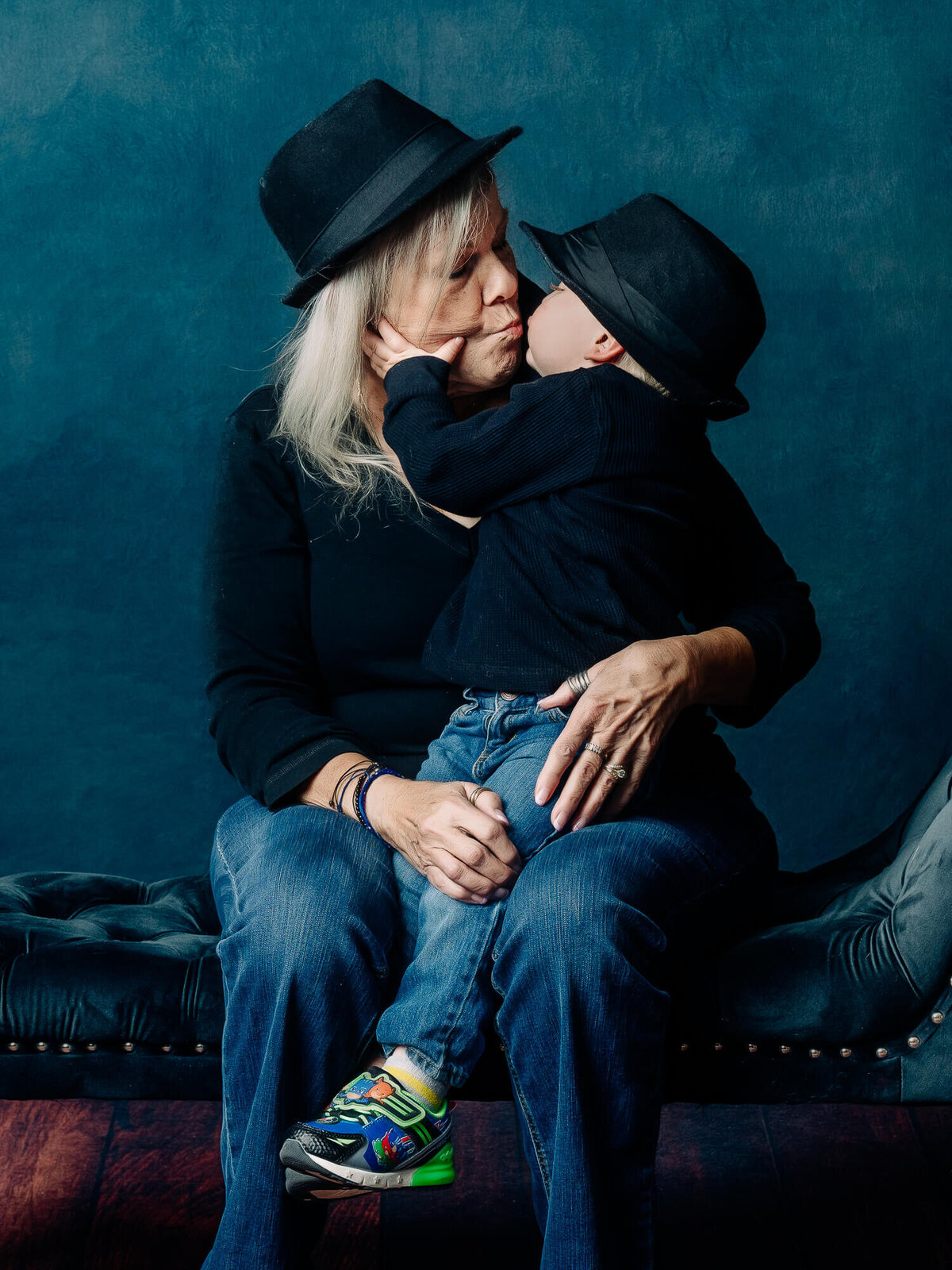 Boy kisses grandma in Prescott family photos