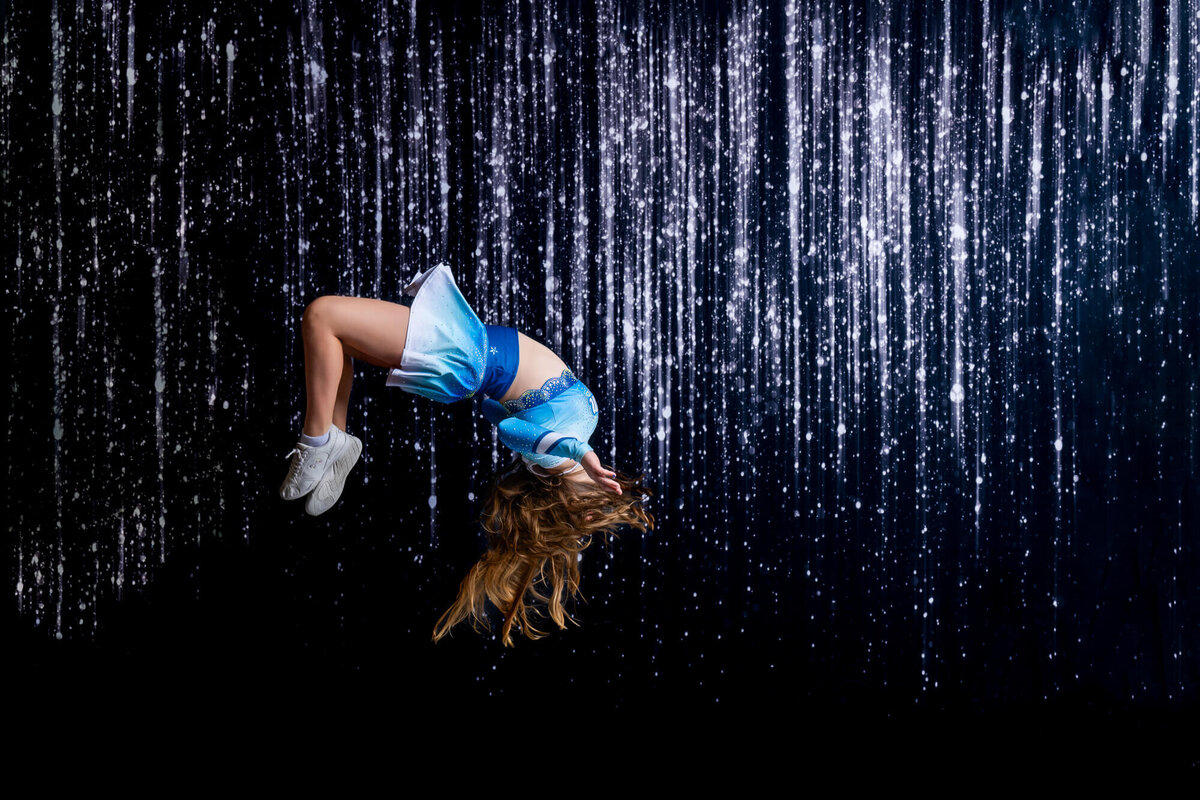 Cheerleader flips in Prescott kids photos by Melissa Byrne