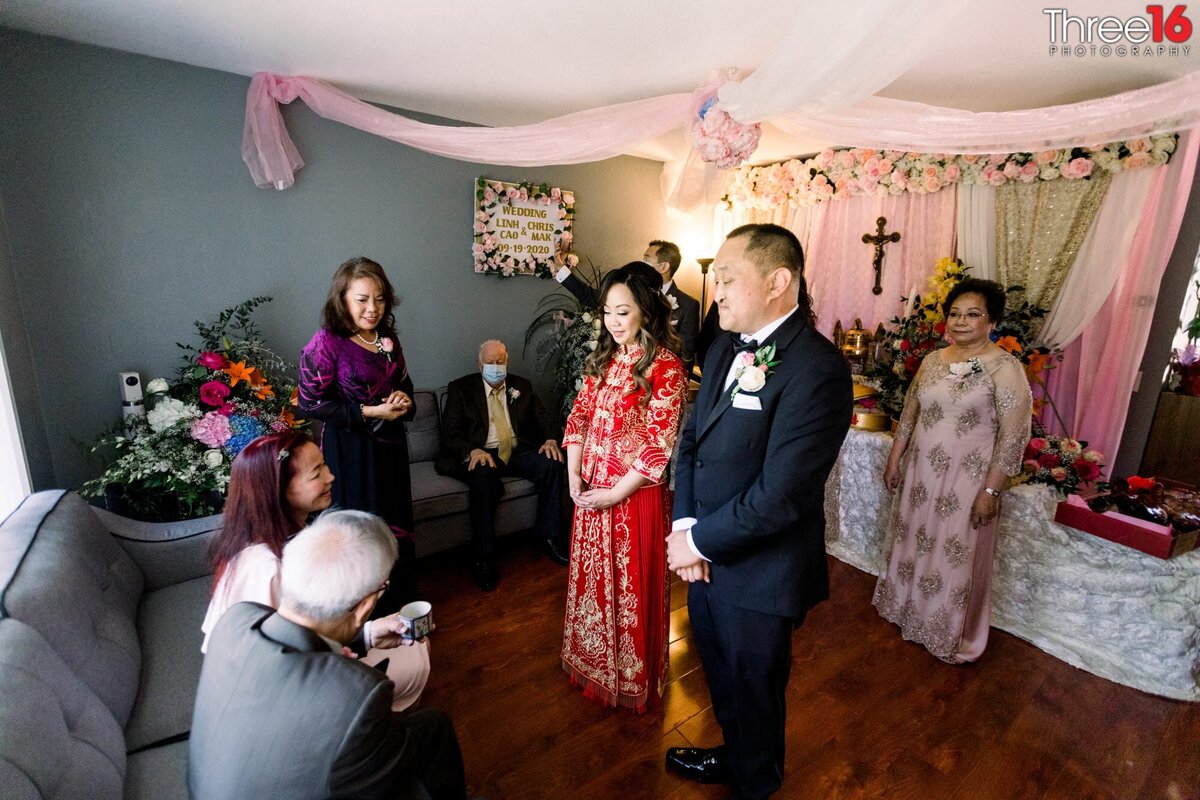 Bride and Groom present tea to parents