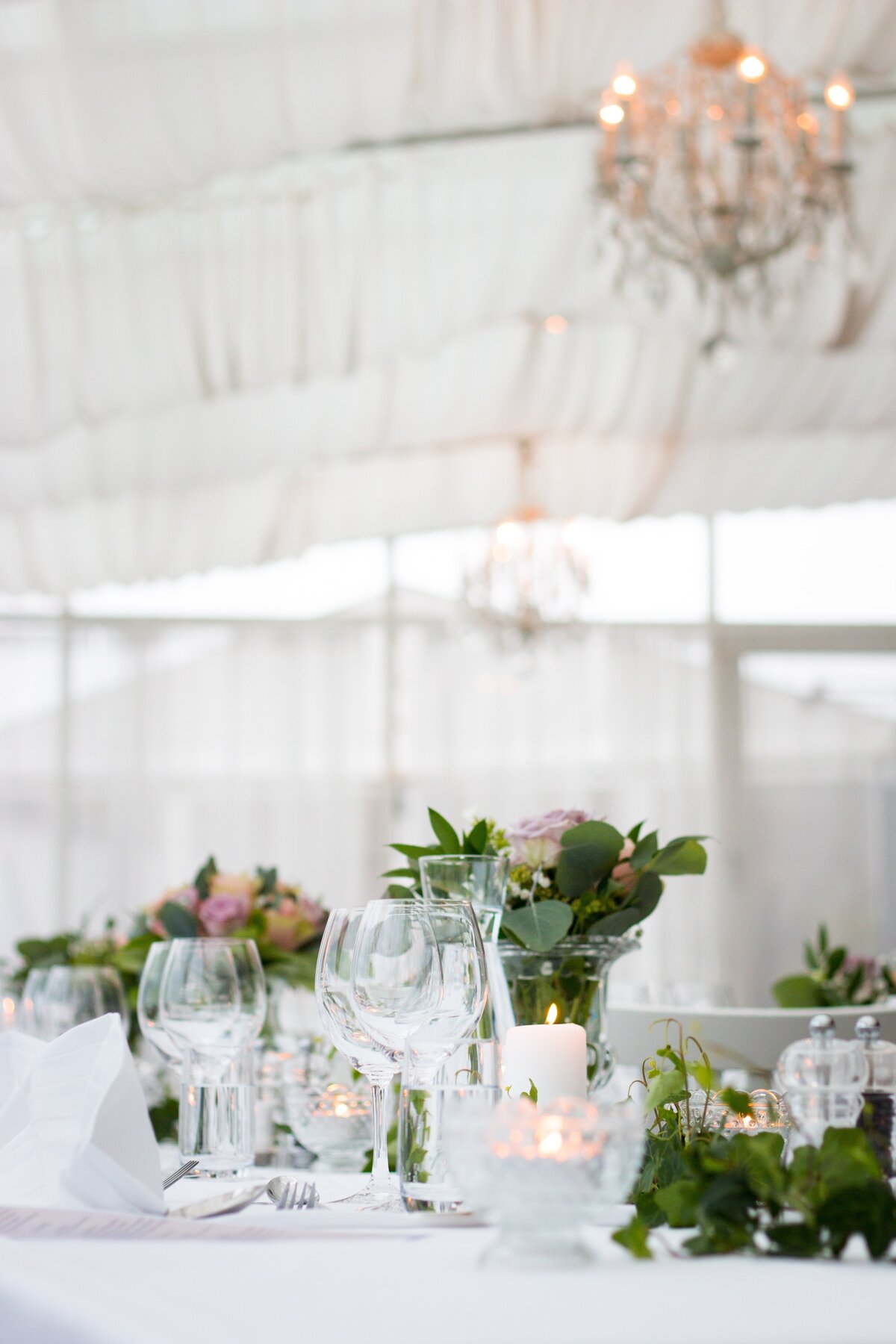 Clean, traditional, white wedding table setting