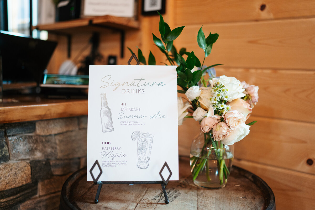 Rustic wedding details with greenery and neutral tones