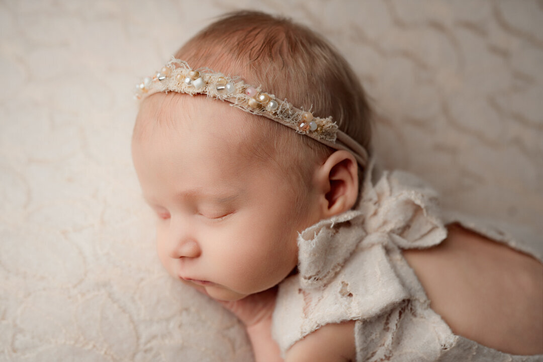 Grand Rapids Newborn Photography Baby Laying on Hand by For the Love of Photography