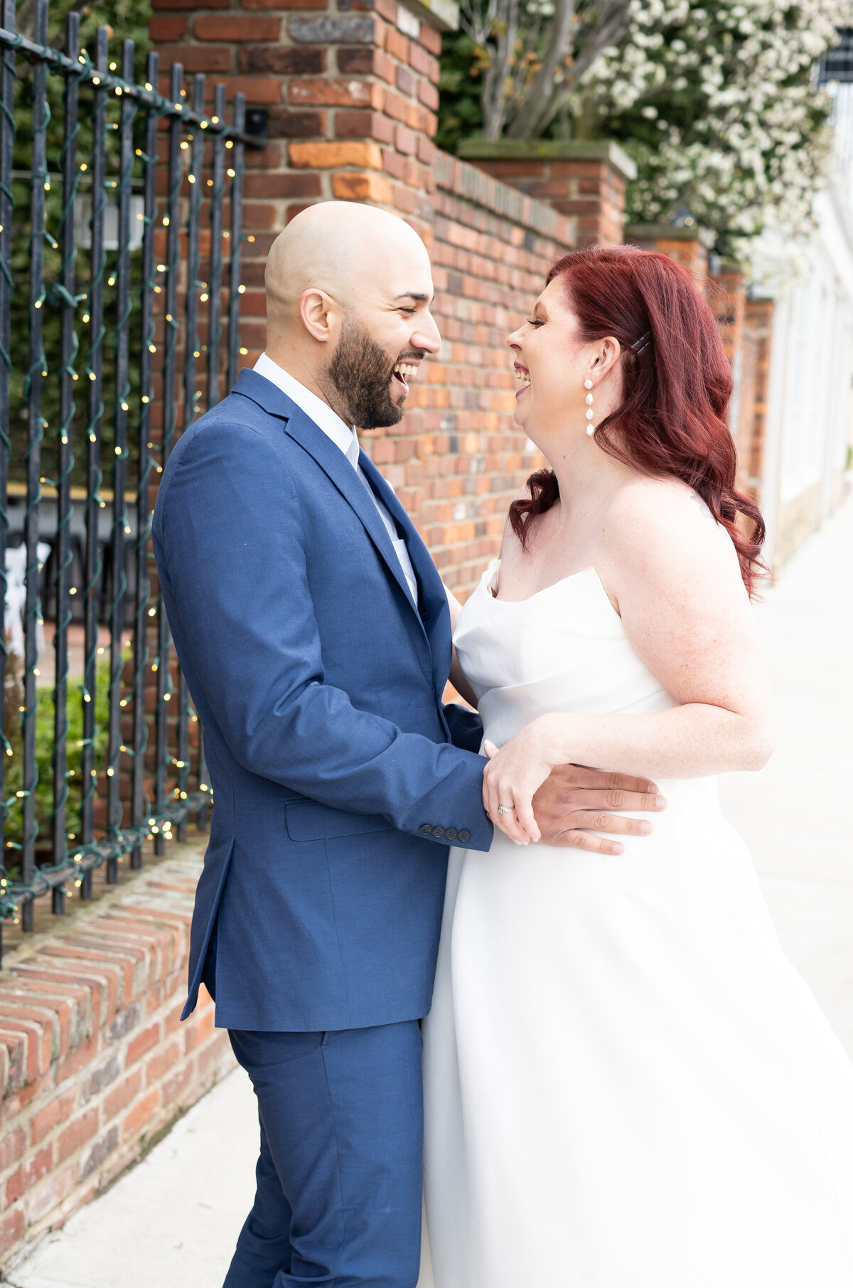 bride and groom candid portrait of laughter and excitement at outdoor wedding Georgetown and Vosh in Lakewood, Ohio