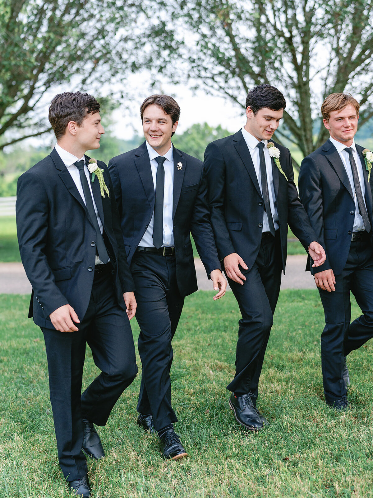 Groom and groomsmen in black suits for a Tennessee wedding