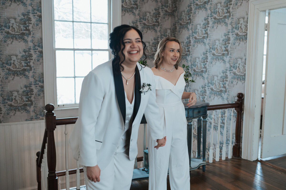 Two women at the landing of a Tennessee home on their elopement day 