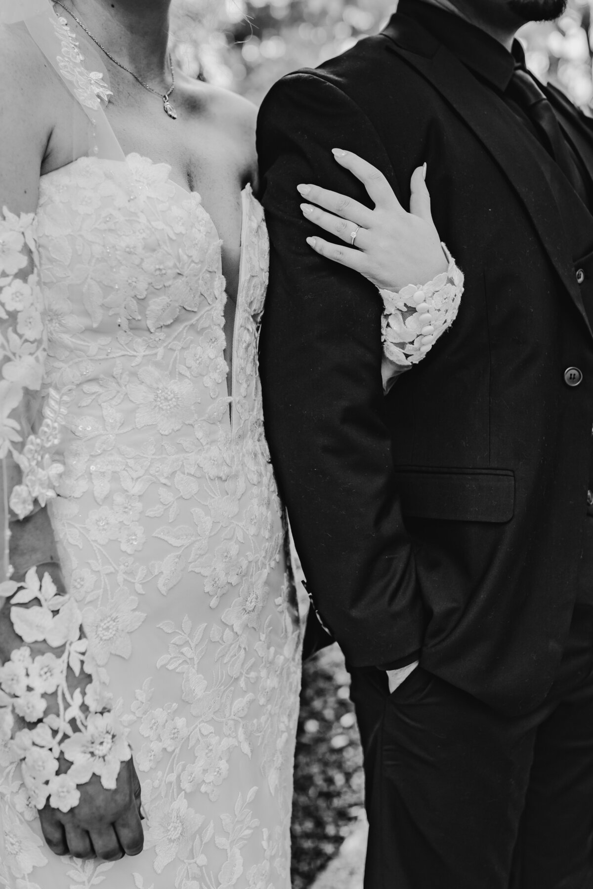 couple-arm-hold-detail-black-and-white-cedar rapids-iowa-wedding-photographer
