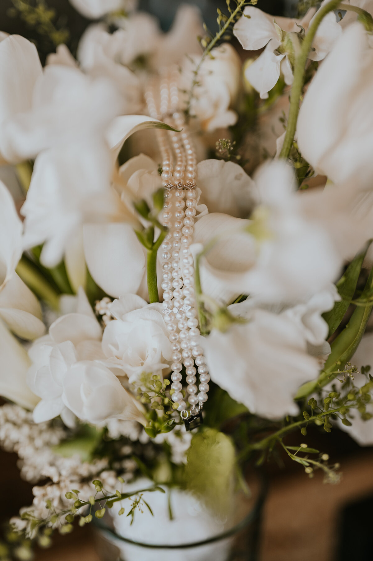 Wedding, elopement, detail, shots of jewelry and wedding rings in Cody Wyoming bouquet