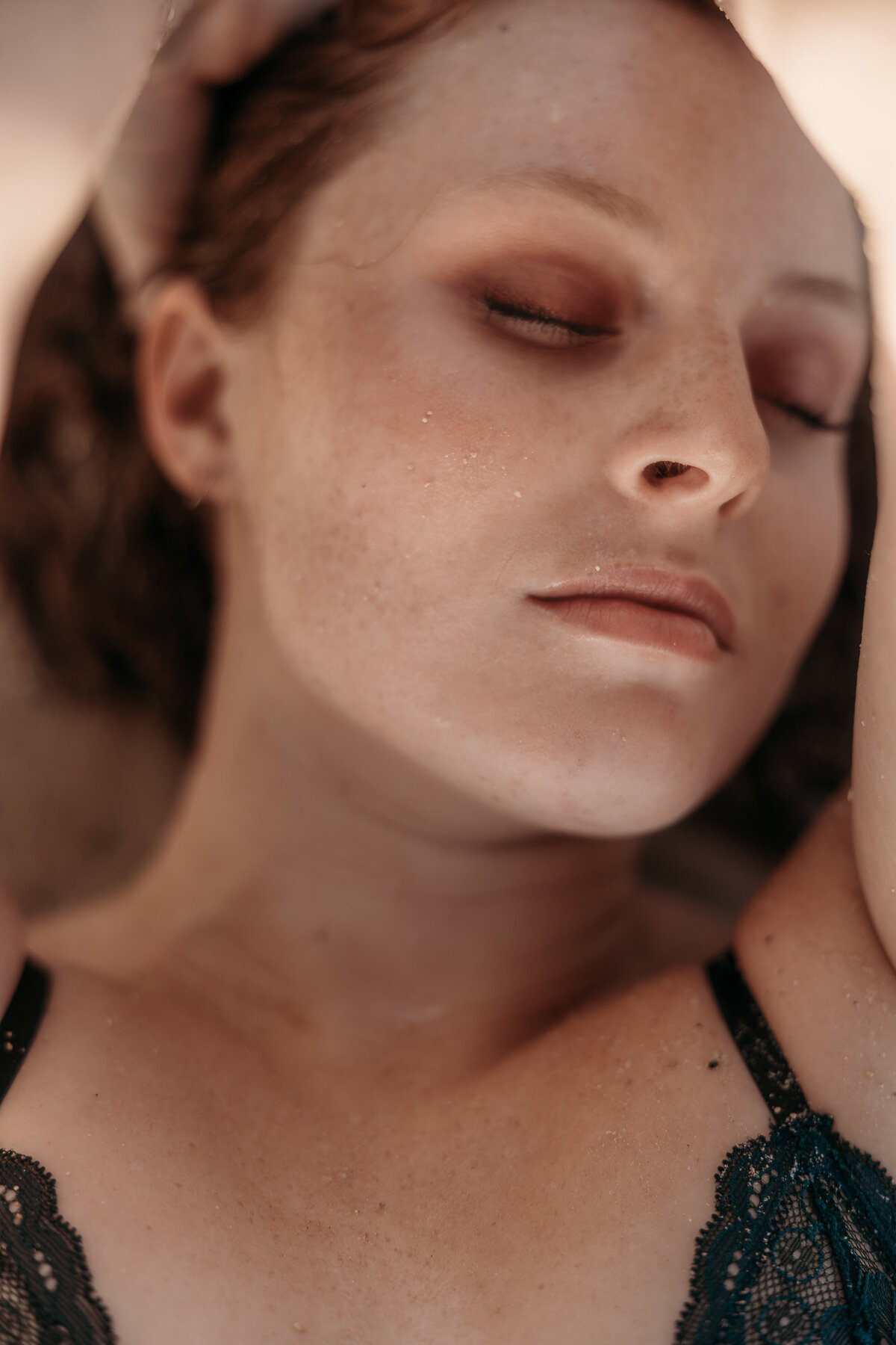 woman on beach close up of her face