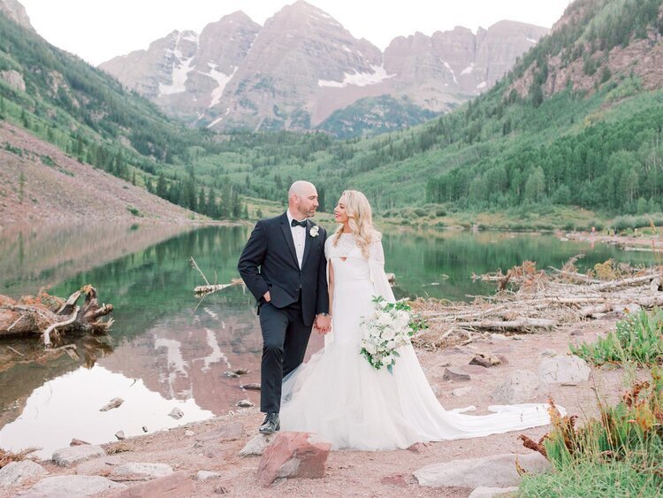 Bride and groom in front of the Maroon Bells in Aspen Colorado