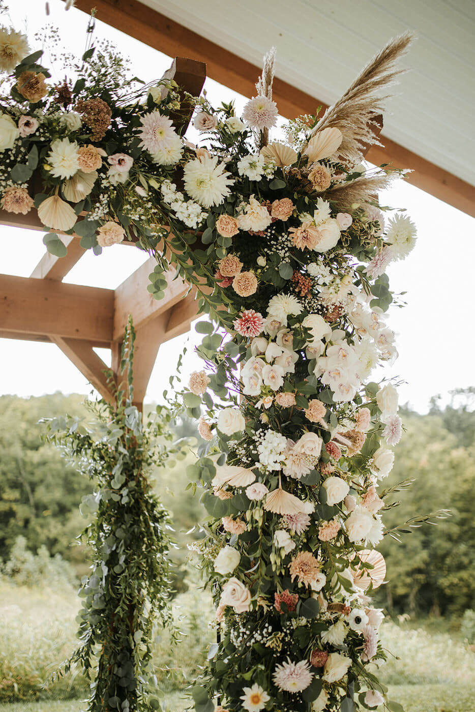 Natalie Brown wedding - ceremony flowers on pergola
