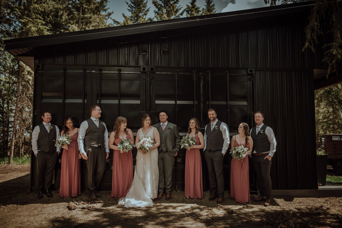 Fall inspired bridal party portrait at 52 North Venue, an industrial and unique wedding venue in Sylvan Lake, AB, featured on the Brontë Bride Vendor Guide.52 North Venue, an industrial and unique wedding venue in Sylvan Lake, AB, featured on the Brontë Bride Vendor Guide.