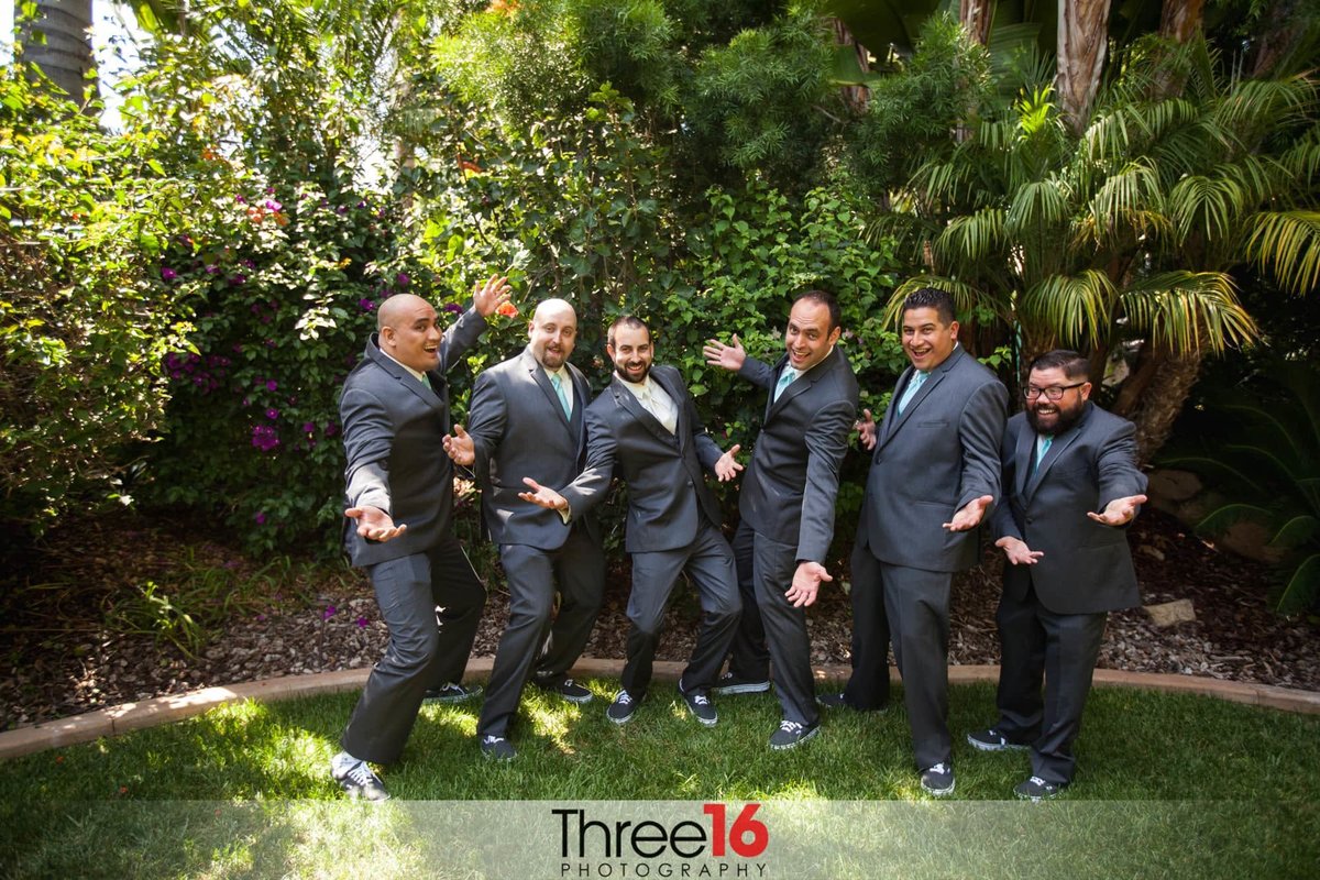 Groom and his groomsmen being goofy