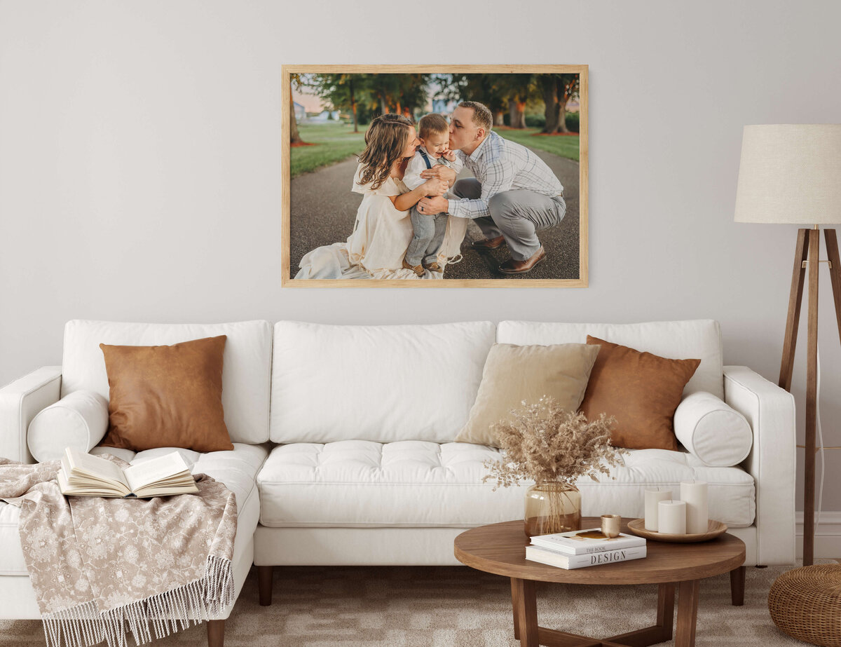 Mock up of living room with family portrait over the sofa