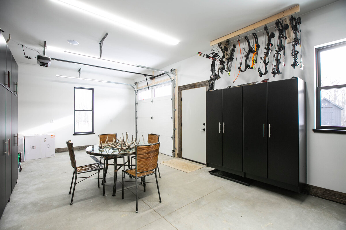 Finished garage with built in storage in Custom Elk River home