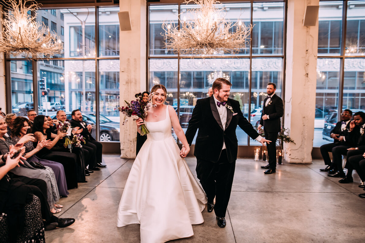 bride and groom processional at willow venue