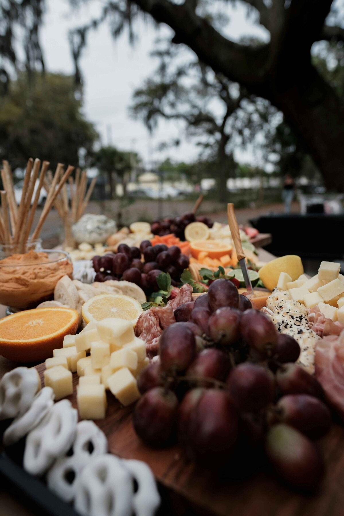 Variety of fruits and cheese spread on a table for an event