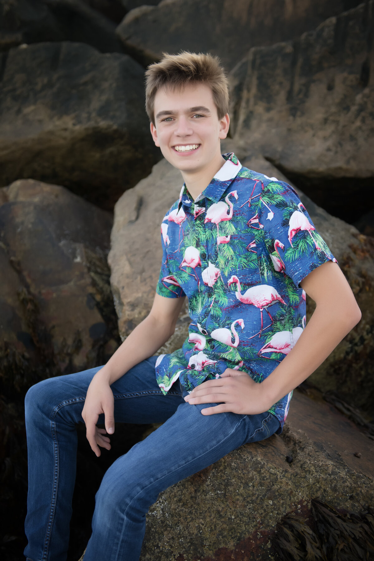 Senior Portrait in Southern Maine on the rocks at the beach