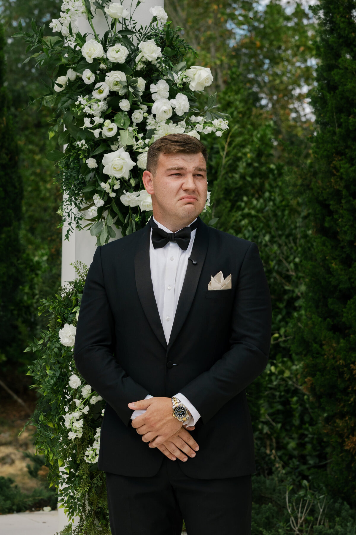 groom crying as bride walks down the aisle at La Casa Toscana