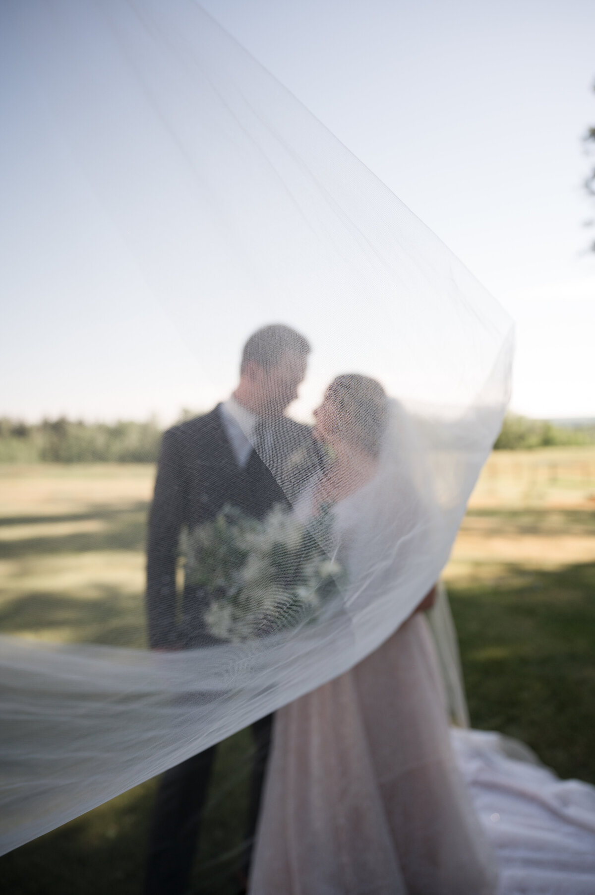 brides veil floating in the wind