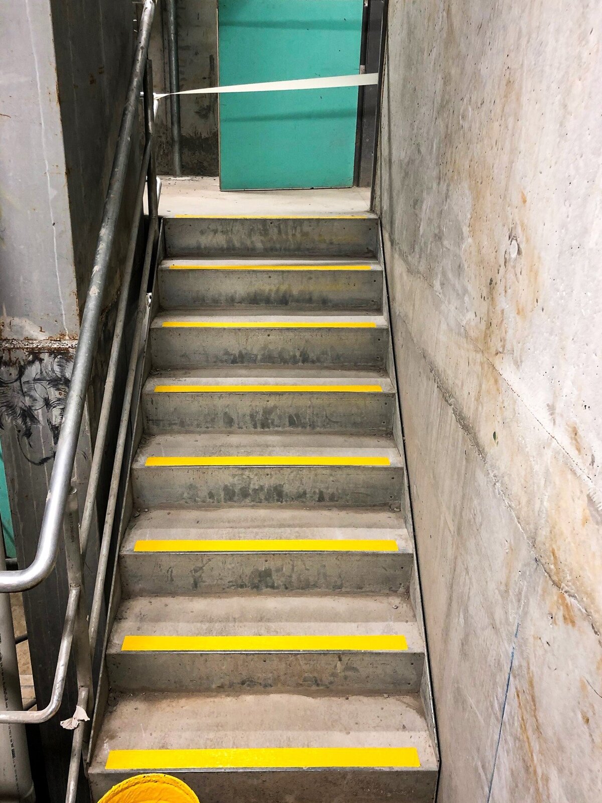 Yellow stair nosing applied to internal stairs