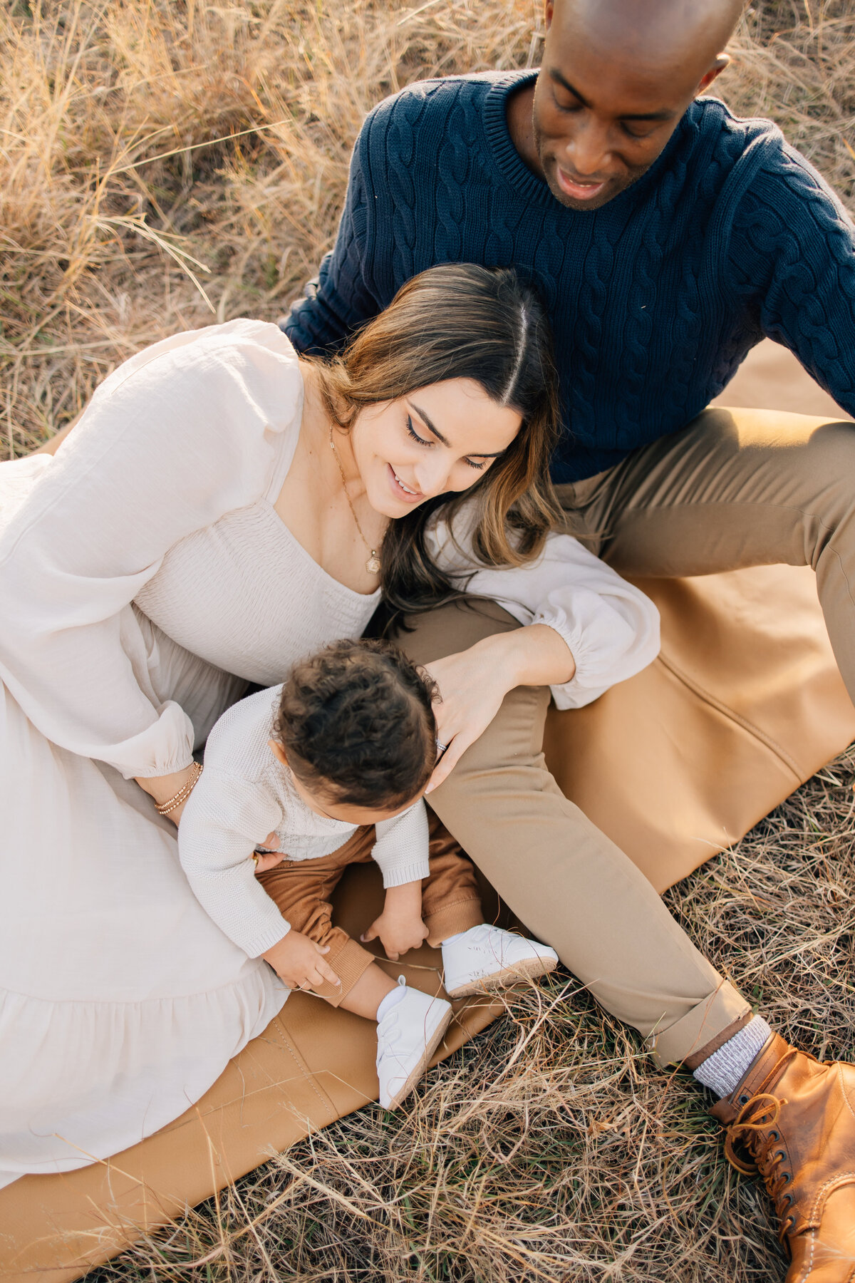Fall family session in a golden field with a toddler boy