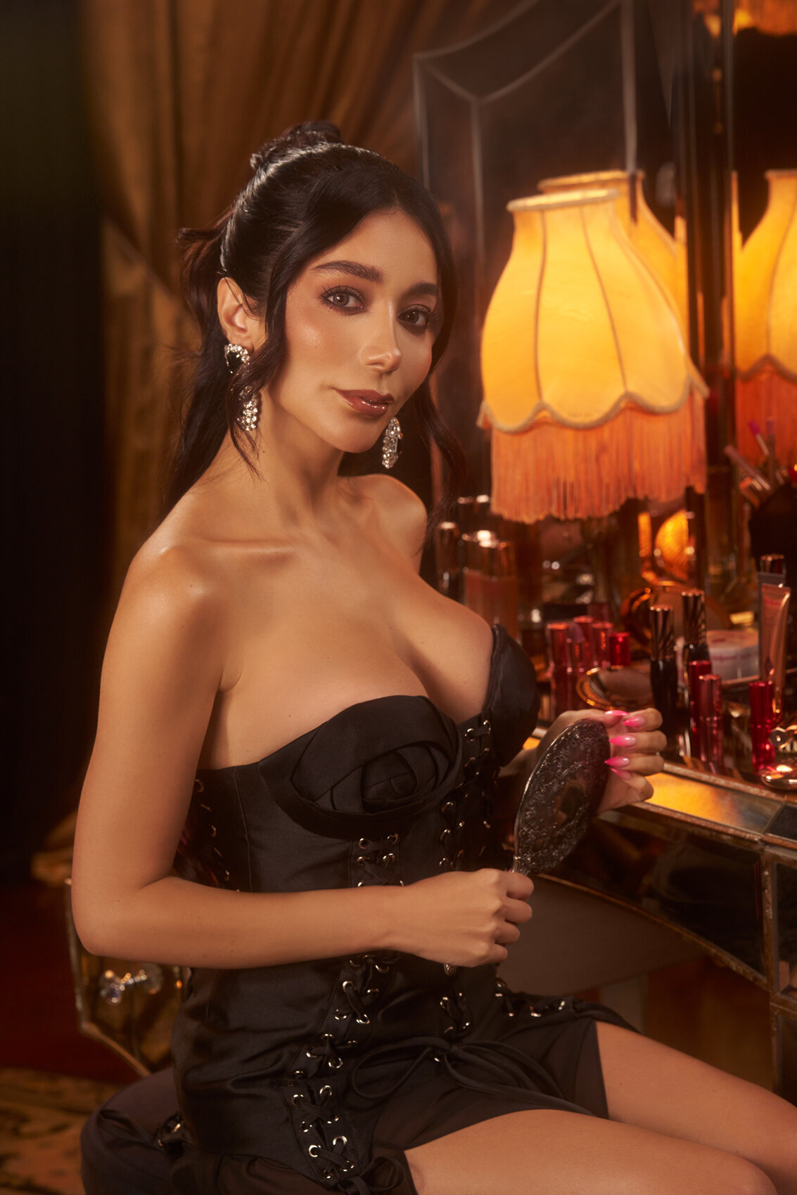 Chic portrait of Shima Katouzian with luxurious makeup, styled by Charlotte Tilbury, captured by Ylva Erevall.