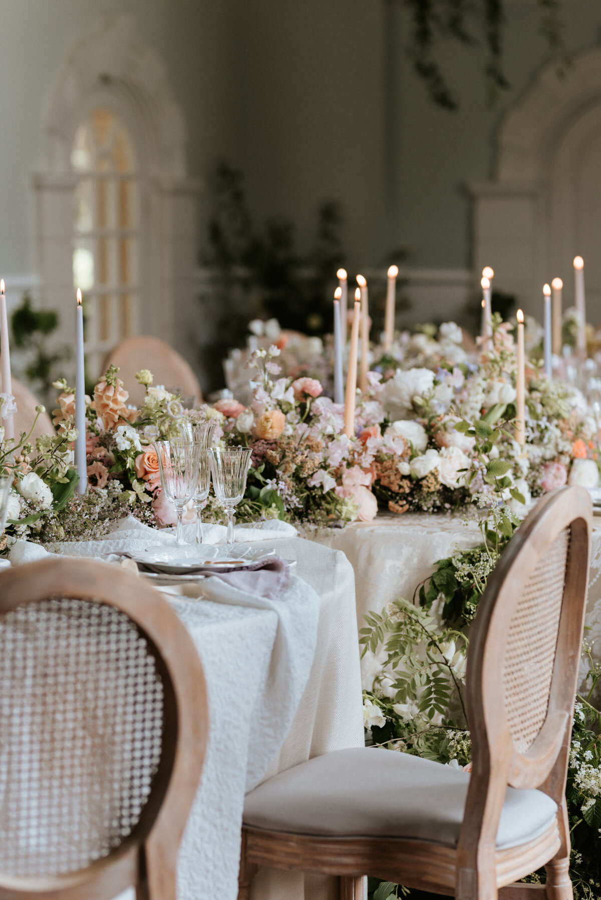 Elegant wedding table styling with blush florals in Cotswold venue