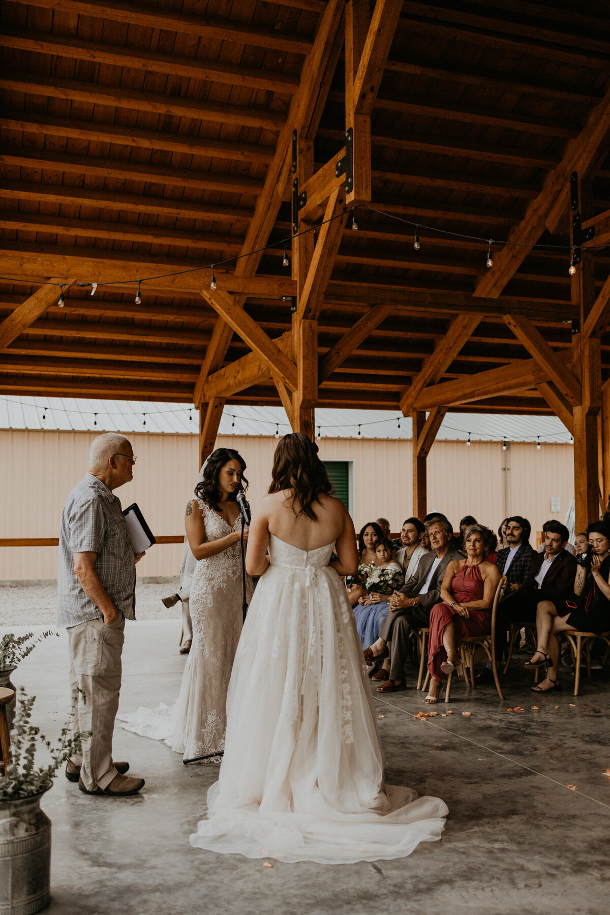 same sex couple intimate wedding ceremony at Log River Ranch in Chama