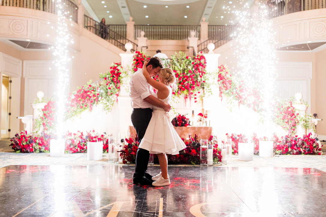 Last dance, cold sparklers, red flowers, staircase flowers, sweetheart table
