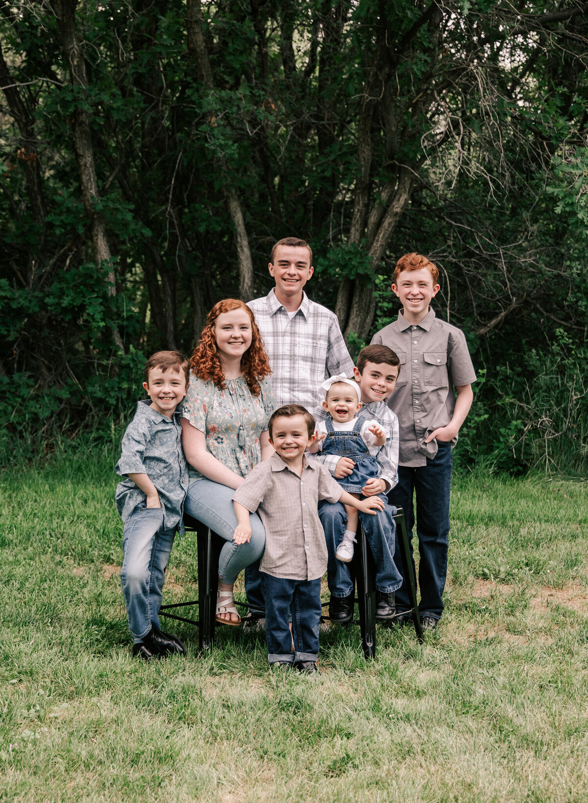 A cute group of kids pose during their family session by Diane Owen.