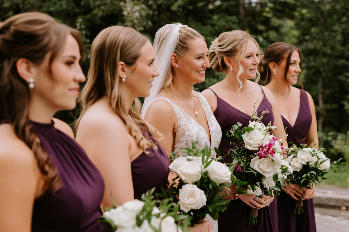 A bride and four bridesmaids stand together at Azuridge Estate Hotel