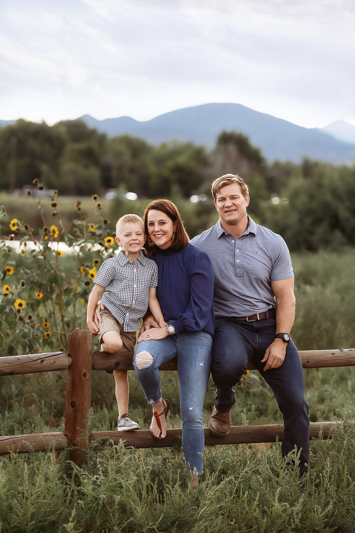 beautiful family photos in loveland field during the summer blooms